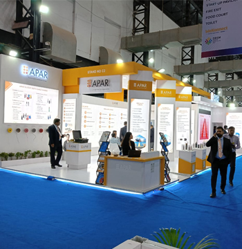 Designers reviewing exhibition models and plans